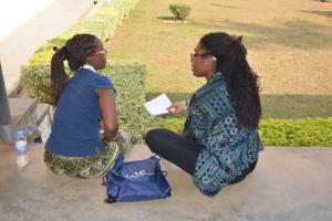 Ampofo consults a YYAS student.