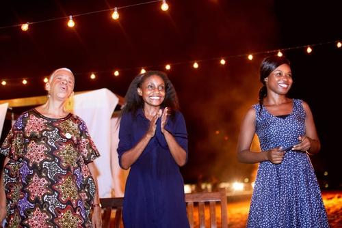 Indaba participants from Tanzania, Zambia and Ghana share a song during Anansesem.